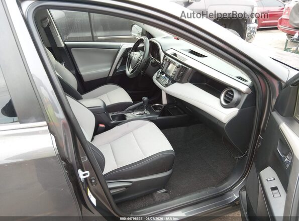 JTMRFREV4JJ183414 2018 TOYOTA LE Gray Front interior view