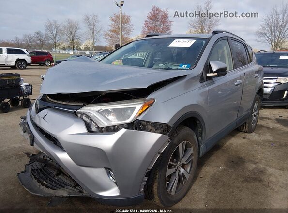 JTMRFREV5JJ211284 2018 TOYOTA LE Silver Front left
