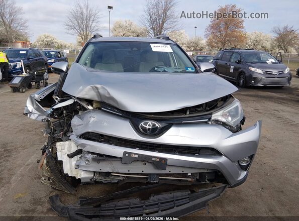 JTMRFREV5JJ211284 2018 TOYOTA LE Silver Front view