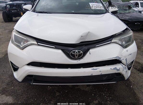 JTMWFREV6JJ150577 2018 TOYOTA LE White ხელსაწყოთა პანელის ხედი