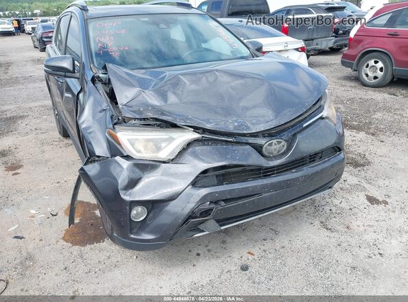 JTMWFREV6JJ155083 2018 TOYOTA LE Gray Vista frontal