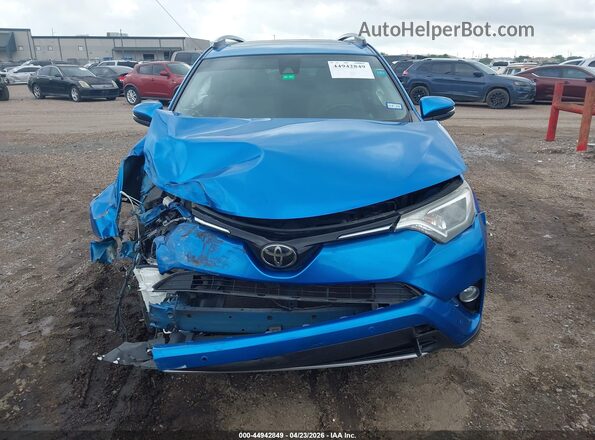JTMWFREV7JJ166481 2018 TOYOTA LE Blue Vista interior trasera