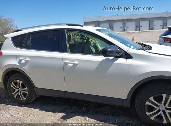 JTMZFREV1GJ100238 2016 TOYOTA LE White Vista interior trasera