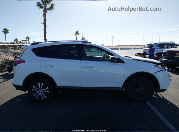 JTMZFREV1JJ151097 2018 TOYOTA LE White Vista interior trasera