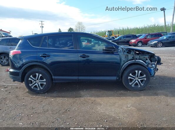 JTMZFREV4JJ748678 2018 TOYOTA LE Dark Blue Rear interior view