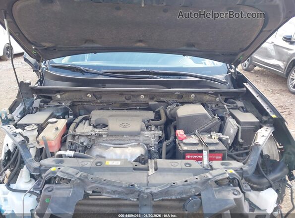 JTMZFREV4JJ748678 2018 TOYOTA LE Dark Blue Rear view