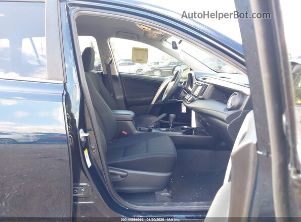 JTMZFREV4JJ748678 2018 TOYOTA LE Dark Blue Front interior view