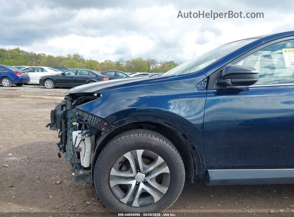 JTMZFREV4JJ748678 2018 TOYOTA LE Dark Blue Front view