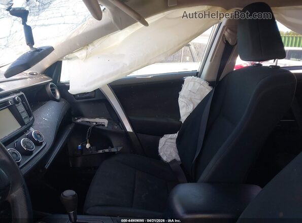 JTMZFREV6GJ065891 2016 TOYOTA LE White Front interior view