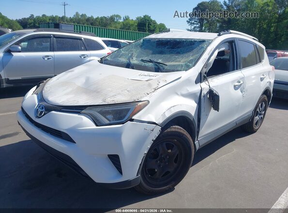 JTMZFREV6GJ065891 2016 TOYOTA LE White Front left