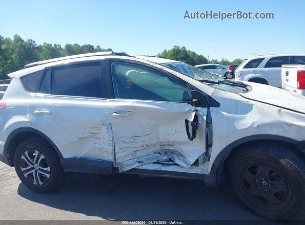 JTMZFREV6GJ065891 2016 TOYOTA LE White Rear interior view