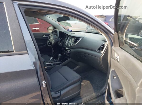 KM8J23A40HU478985 2017 HYUNDAI TUCSON Gray წინა სალონის ხედი