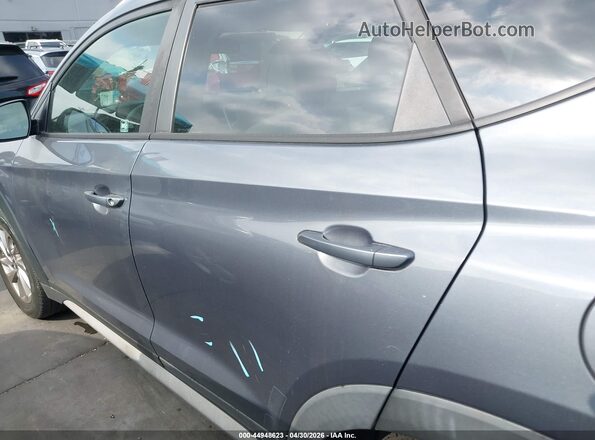 KM8J3CA42JU604749 2018 HYUNDAI TUCSON Серый 