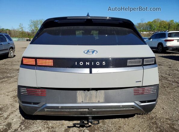KM8KMDAF9NU056506 2022 HYUNDAI IONIQ Gray Widok z tyłu