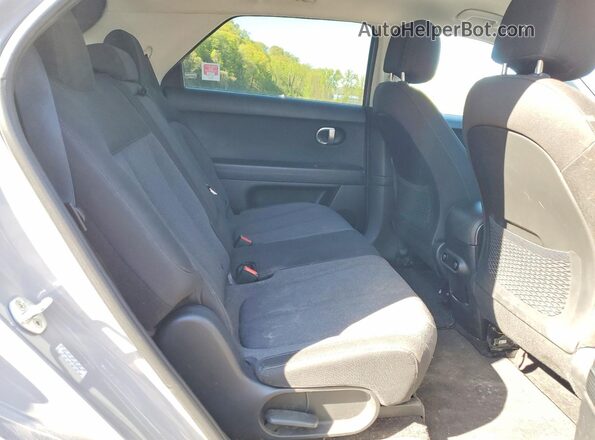 KM8KMDAF9NU056506 2022 HYUNDAI IONIQ Gray Widok tylnych siedzeń