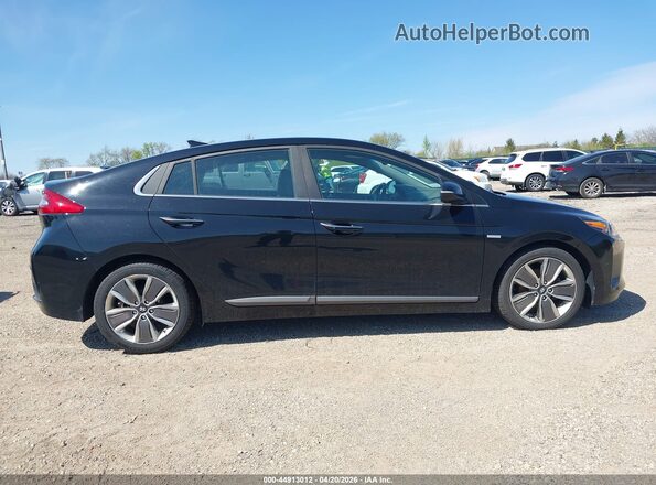 KMHC05LC5JU071958 2018 HYUNDAI IONIQ HYBRID Black Vista interior trasera