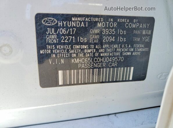 KMHC65LC0HU049570 2017 HYUNDAI IONIQ White VIN sticker view