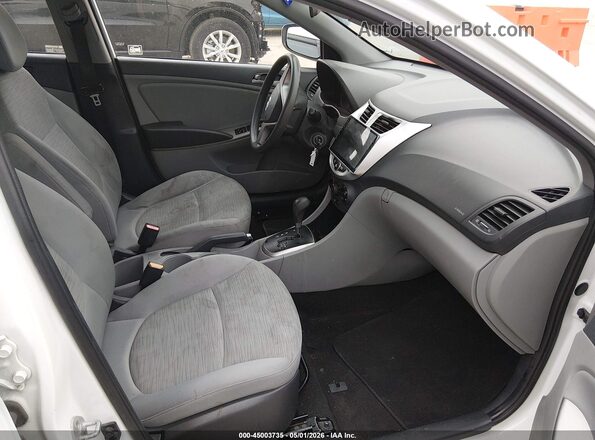 KMHCT4AE6GU012593 2016 HYUNDAI ACCENT White Front interior view