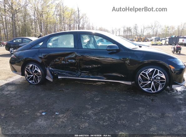 KMHM54AC7SA093241 2025 HYUNDAI IONIQ 6 Black Սալոնի հետևի տեսք