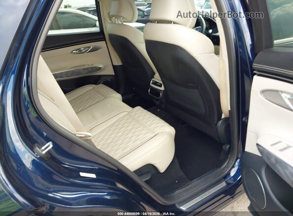 KMUMCDTC5NU073867 2022 GENESIS GV70 Black Vista de la etiqueta del VIN
