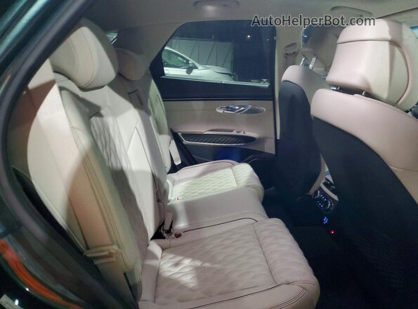 KMUMCDTC6PU124103 2023 GENESIS GV70 Green Rear interior view
