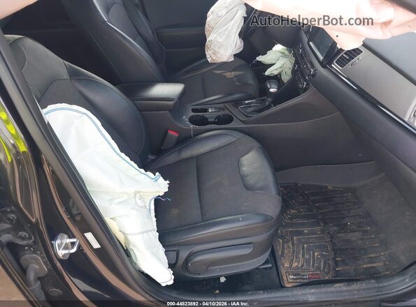 KNDCC3LC2H5056256 2017 KIA NIRO Black Vista interior delantera