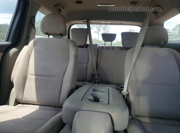 KNDMB5C14H6219825 2017 KIA SEDONA Blue Vista de los asientos traseros