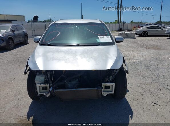 KNDMB5C15H6265258 2017 KIA SEDONA Silver Widok wnętrza z tyłu