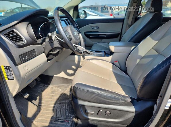 KNDMB5C18K6517673 2019 KIA SEDONA Black Front interior view