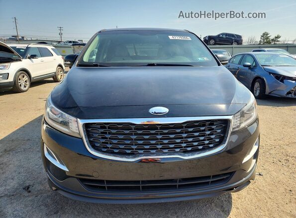 KNDMB5C18K6517673 2019 KIA SEDONA Black Front view