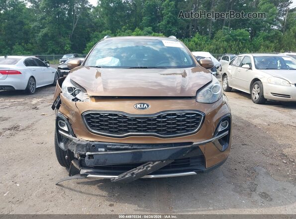 KNDP63AC7M7922768 2021 KIA SPORTAGE Brown Widok wnętrza z tyłu