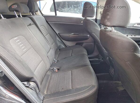 KNDPMCAC0J7396436 2018 KIA SPORTAGE Black Rear seats view