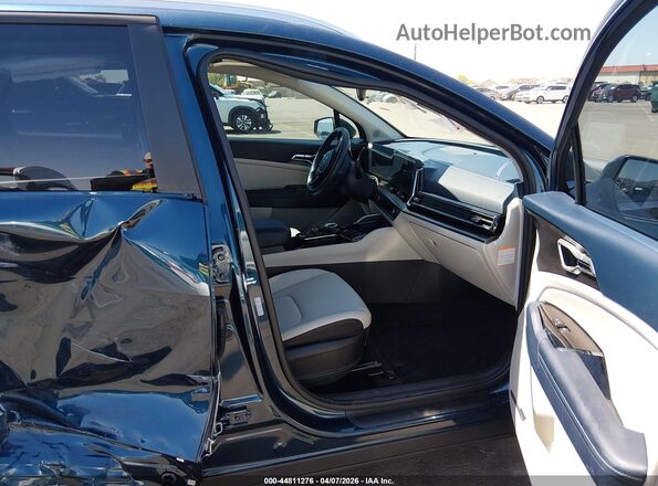 KNDPVCDG8S7240285 2025 KIA SPORTAGE HYBRID Blue Front interior view