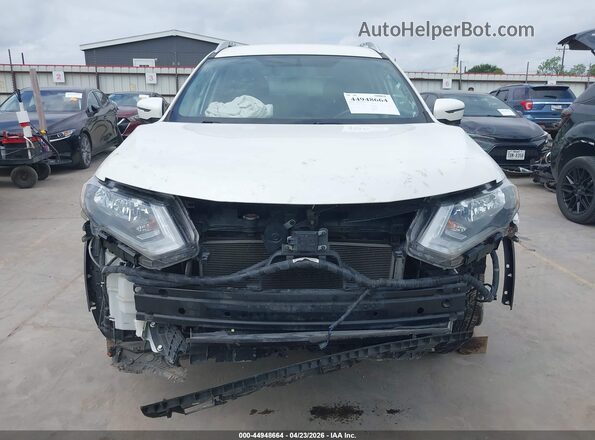 KNMAT2MT1HP595665 2017 NISSAN ROGUE White Vista interior trasera