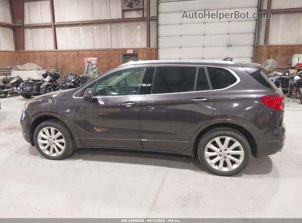 LRBFXESX9GD214094 2016 BUICK ENVISION Brown Rear interior view