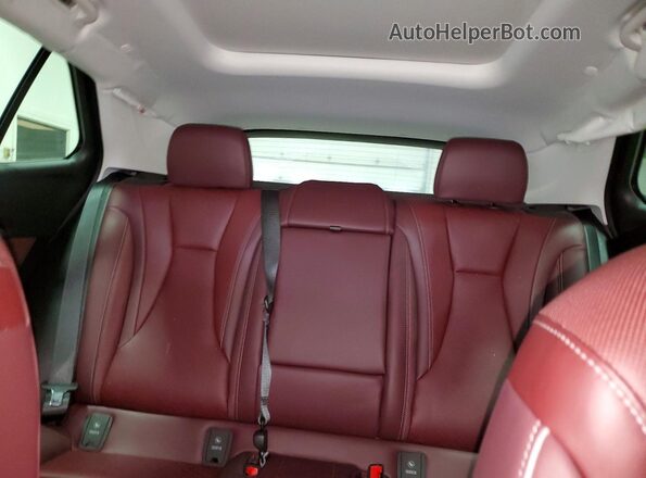 LRBFZLE48SD028183 2025 BUICK ENVISION Burgundy Vista de los asientos traseros