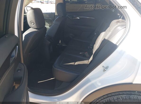 LRBFZNR47PD084371 2023 BUICK ENVISION White Вид наклейки з VIN-кодом
