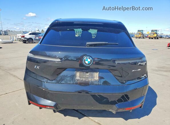 WB523CF02SCS46201 2025 BMW IX Black Widok z tyłu