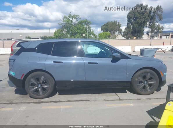 WB523CF02SCU85568 2025 BMW IX Gray უკანა სალონის ხედი