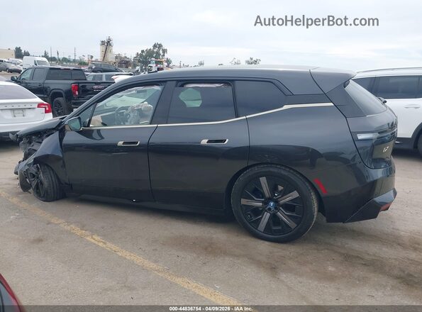WB523CF03SCT84376 2025 BMW IX Black Вид задньої частини салону