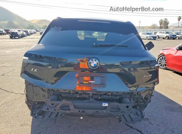 WB523CF04RCN52035 2024 BMW IX Black Widok z tyłu