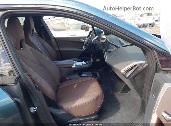 WB523CF04SCS98428 2025 BMW IX Beige Front interior view