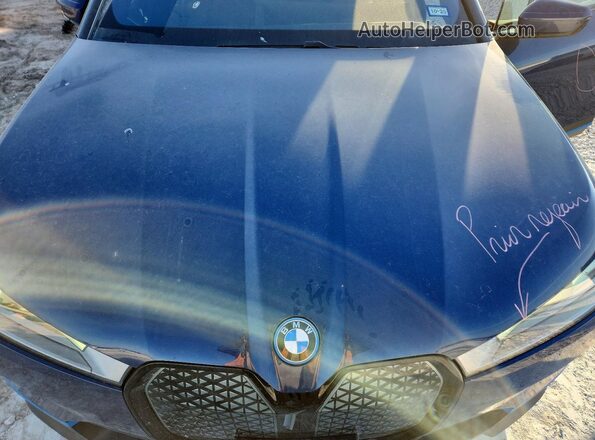 WB523CF05PCL75699 2023 BMW IX Blue Engine compartment view