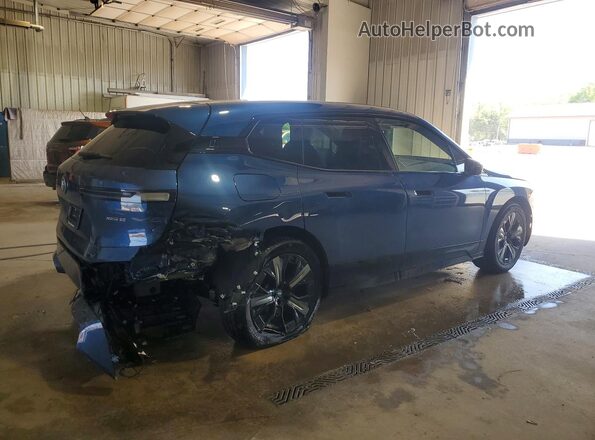 WB523CF06RCP11220 2024 BMW IX Blue Հետևի աջ