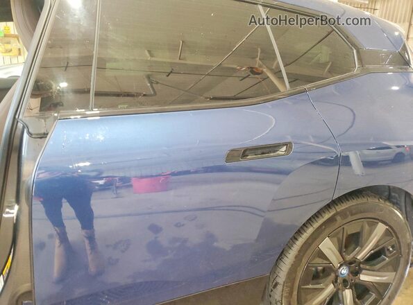 WB523CF06RCP11220 2024 BMW IX Blue Հետևի նստատեղերի տեսք