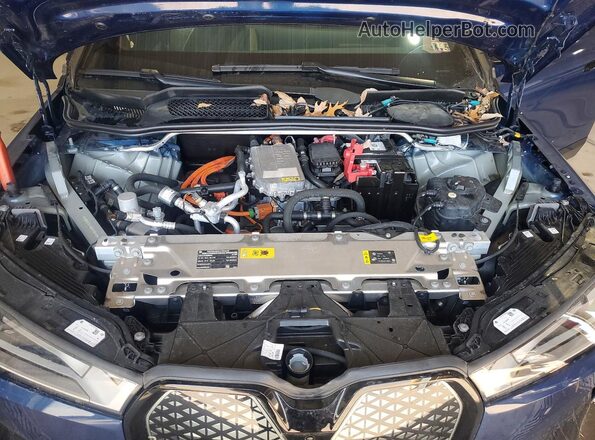 WB523CF06RCP11220 2024 BMW IX Blue Սալոնի հետևի տեսք