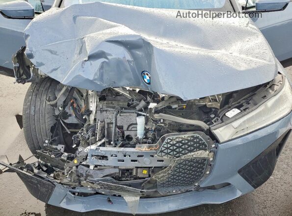 WB523CF07RCN47833 2024 BMW IX Gray Widok komory silnika