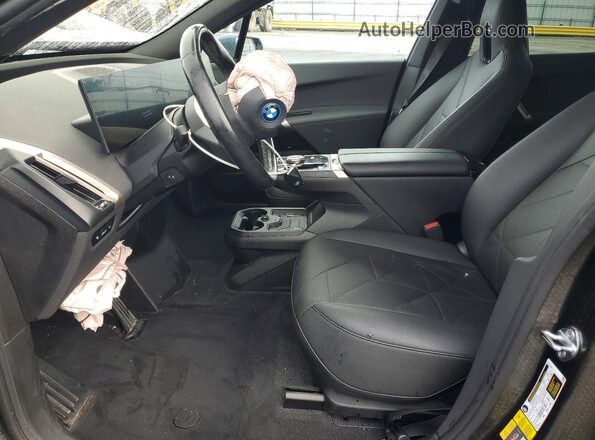 WB523CF07RCN47833 2024 BMW IX Gray Widok wnętrza z przodu