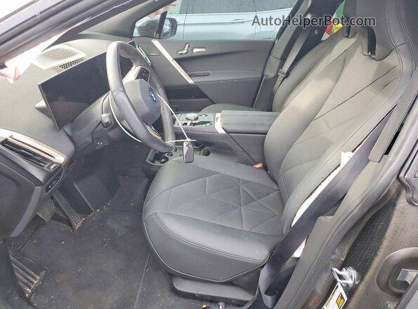 WB523CF07SCS20502 2025 BMW IX Gray Widok wnętrza z przodu
