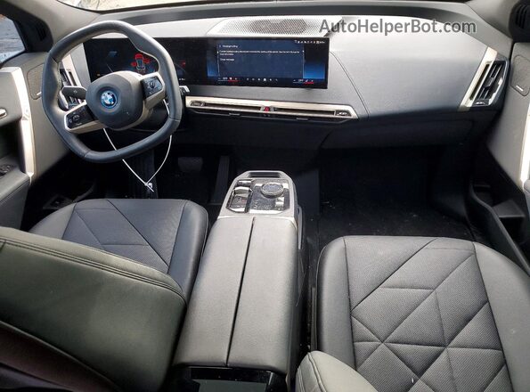 WB523CF07SCS20502 2025 BMW IX Gray Widok deski rozdzielczej